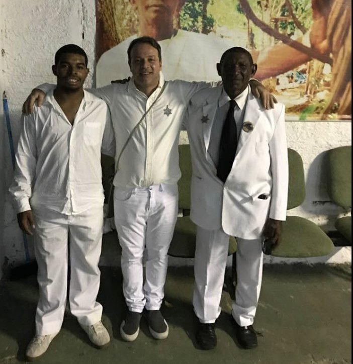 Marcio Purusha — Founder Of Queen Of The Forest 2 Marcio Purusha — Founder Of Queen Of The Forest Marcio Purusha in white Santo Daime farda with community elders