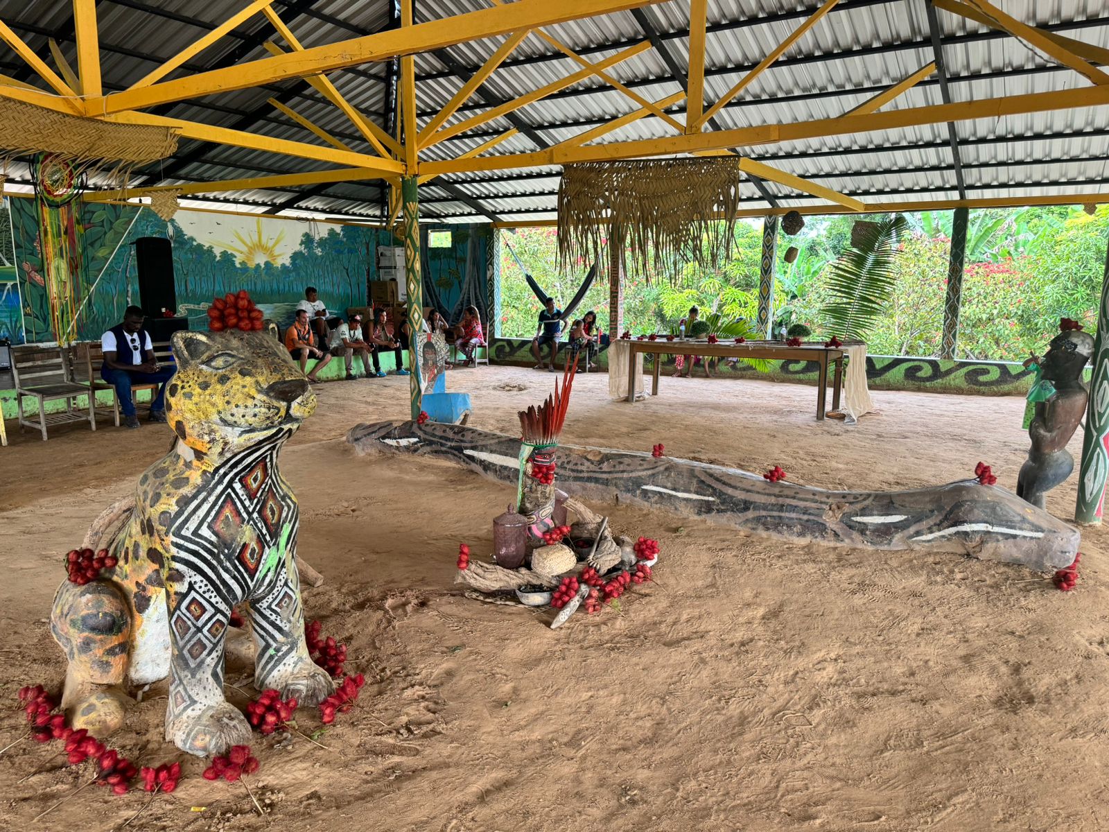 Terreiro ceremonial grounds of Aldeia Pinuyá with jaguar sculpture